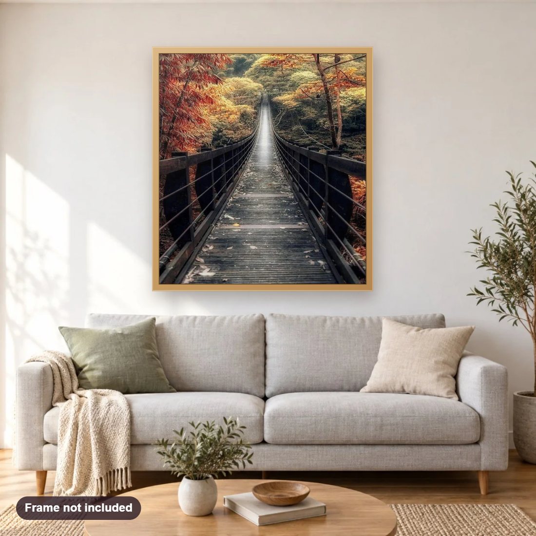 Bridge Landscape diamond painting shown framed on a living room wall above a sofa