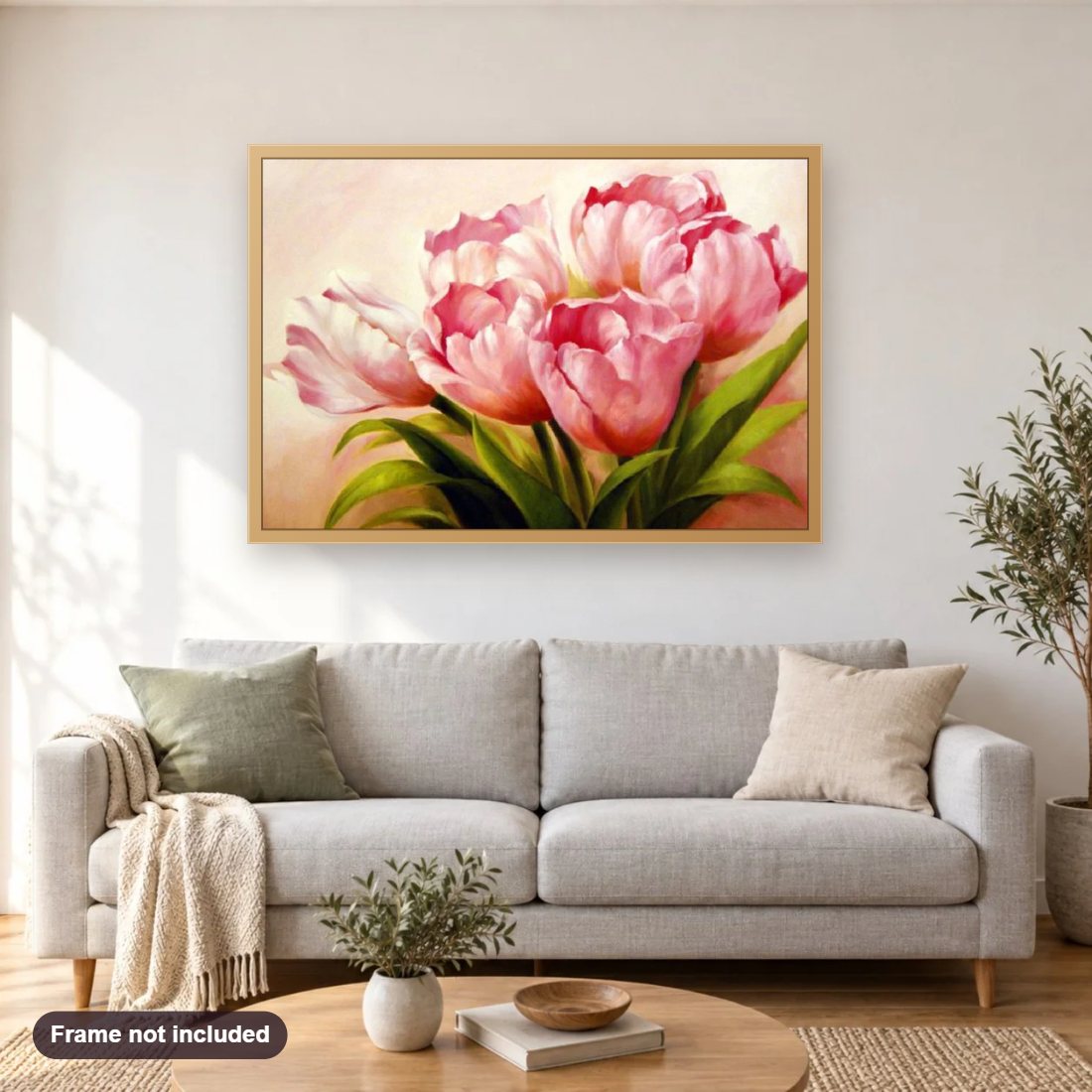 Bunch of Pink Tulips diamond painting shown framed on a living room wall above a sofa