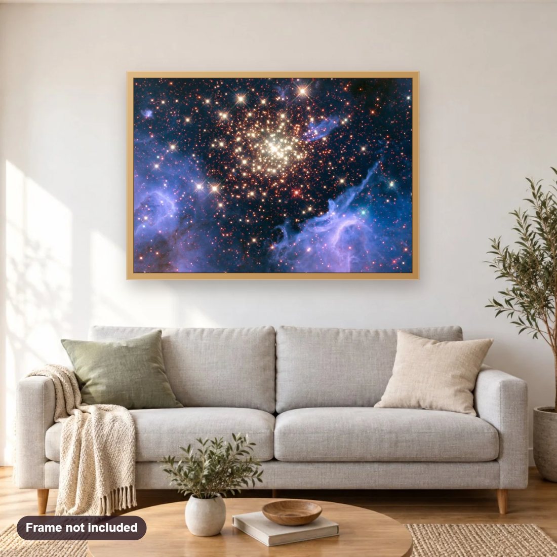 Burst of Celestial Fireworks diamond painting shown framed on a living room wall above a sofa