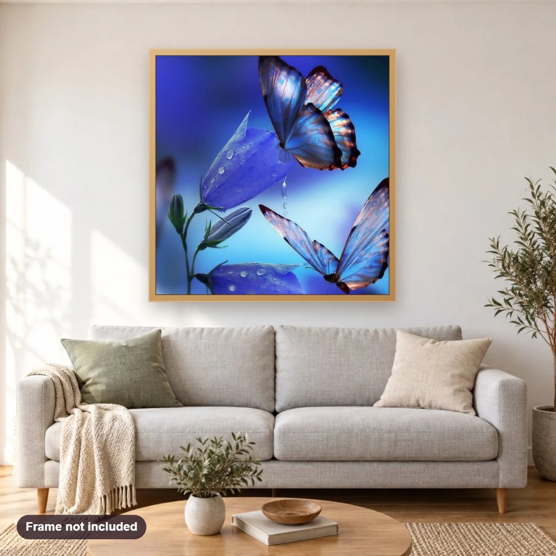 Butterflies Drinking Flower Nectar diamond painting shown framed on a living room wall above a sofa
