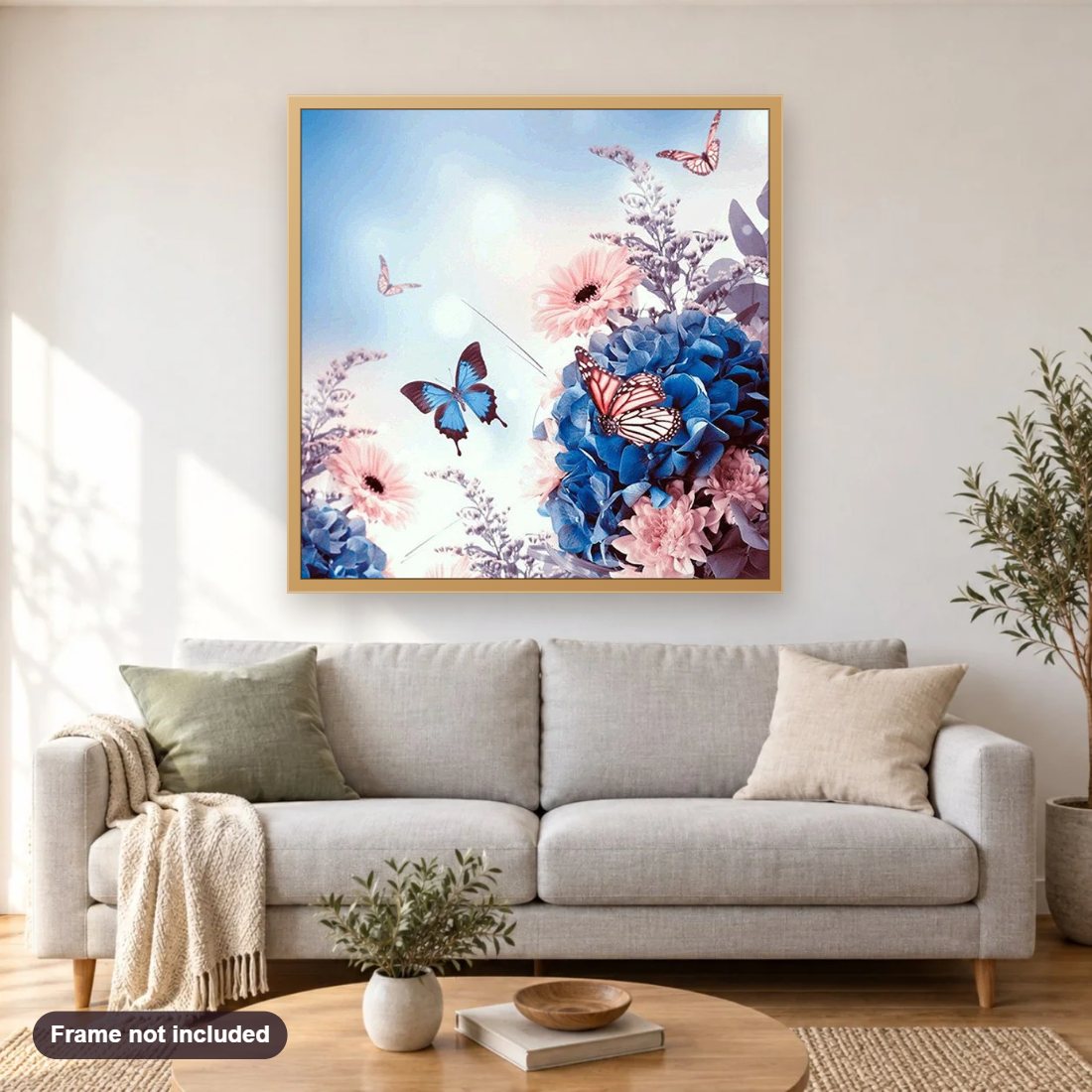 Butterflies Flying to Sky diamond painting shown framed on a living room wall above a sofa