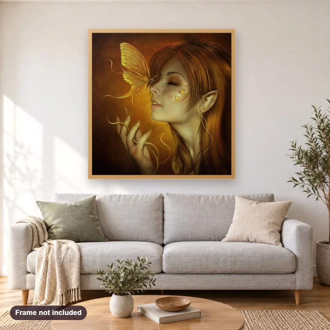 Butterfly Girl diamond painting shown framed on a living room wall above a sofa