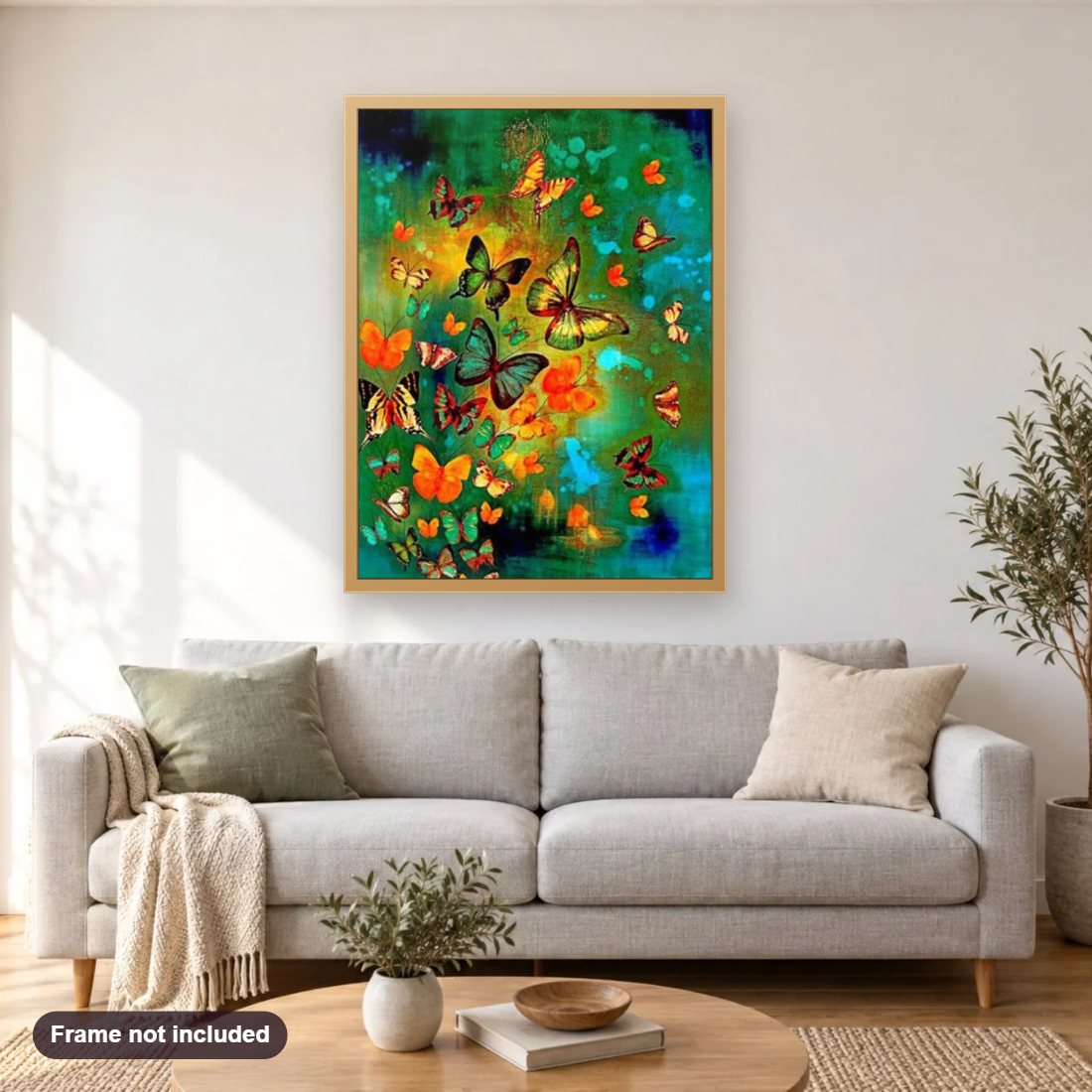 Butterfly Kingdom diamond painting shown framed on a living room wall above a sofa