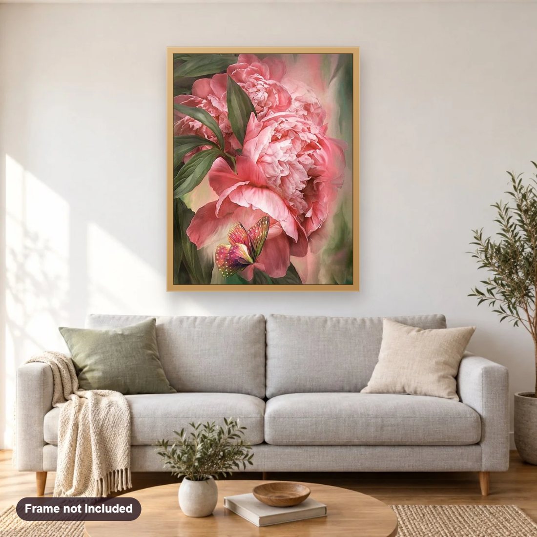 Butterfly & Pink Peonies diamond painting shown framed on a living room wall above a sofa