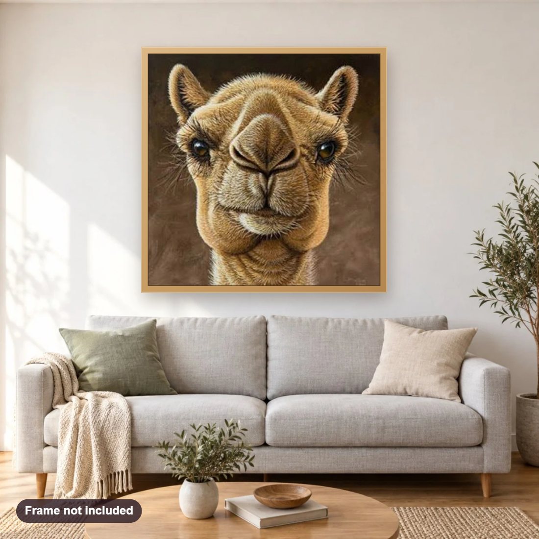 Camel diamond painting shown framed on a living room wall above a sofa