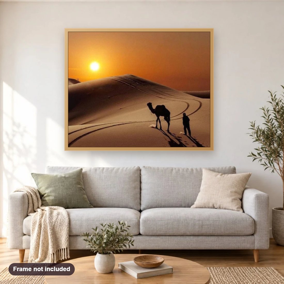 Camel in the Desert diamond painting shown framed on a living room wall above a sofa