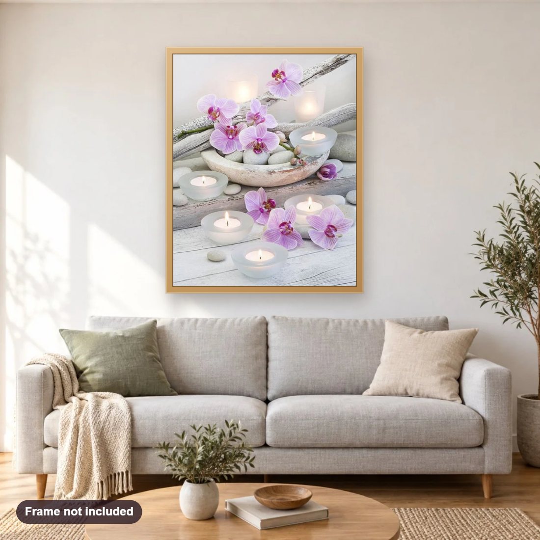 Candles & Flowers diamond painting shown framed on a living room wall above a sofa