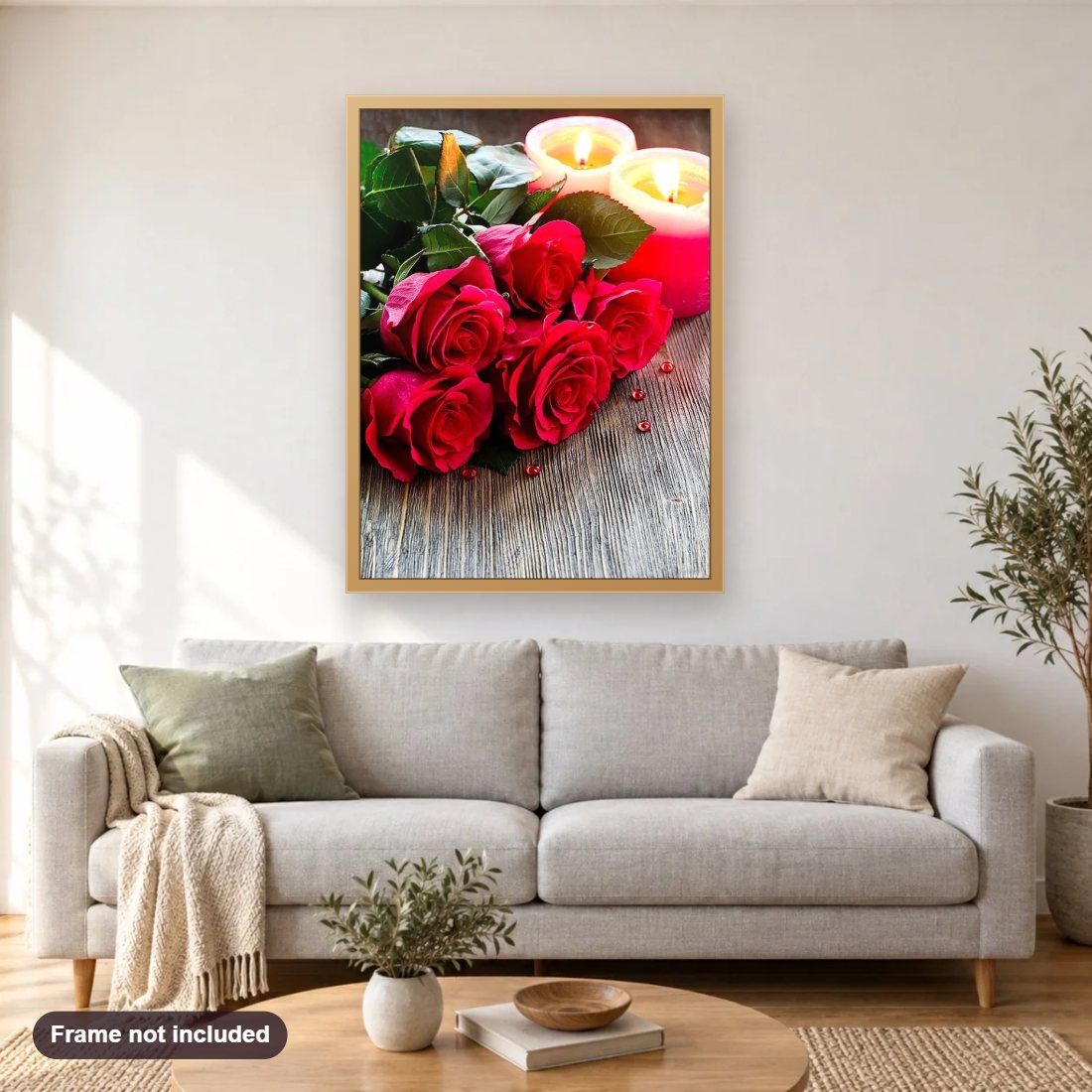 Candles & Roses diamond painting shown framed on a living room wall above a sofa
