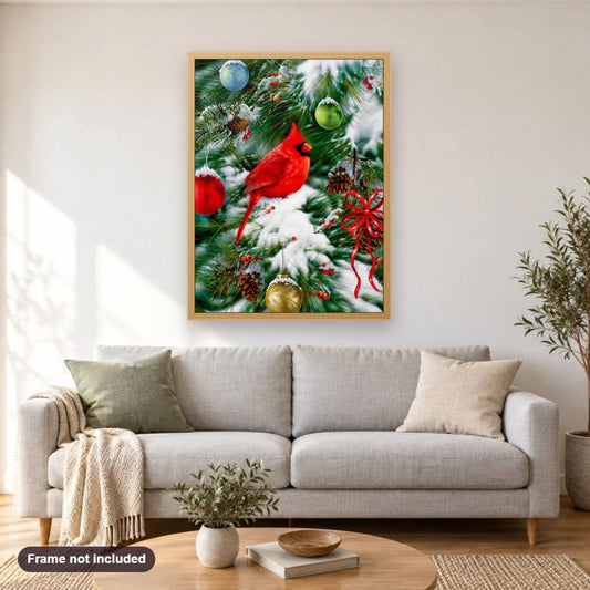 Cardinal Sitting on Christmas Tree diamond painting shown framed on a living room wall above a sofa