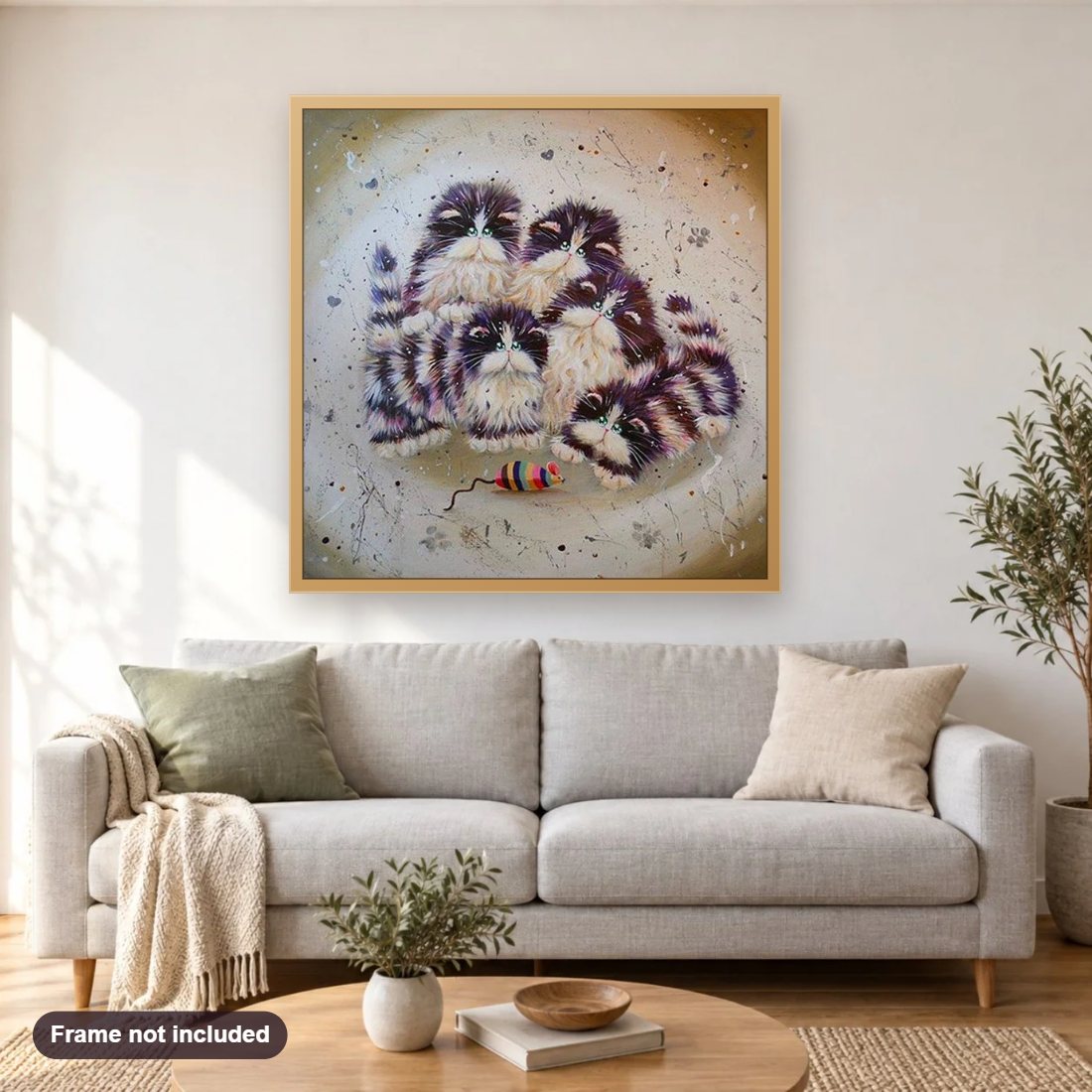 Cartoon Cats & Colorful Mouse diamond painting shown framed on a living room wall above a sofa