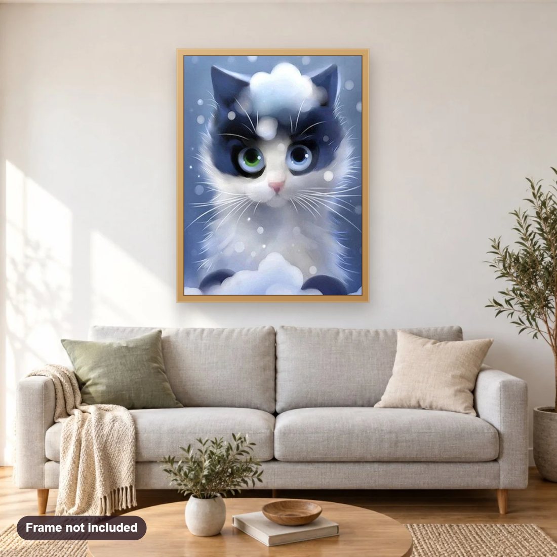 Cartoon Kitty diamond painting shown framed on a living room wall above a sofa