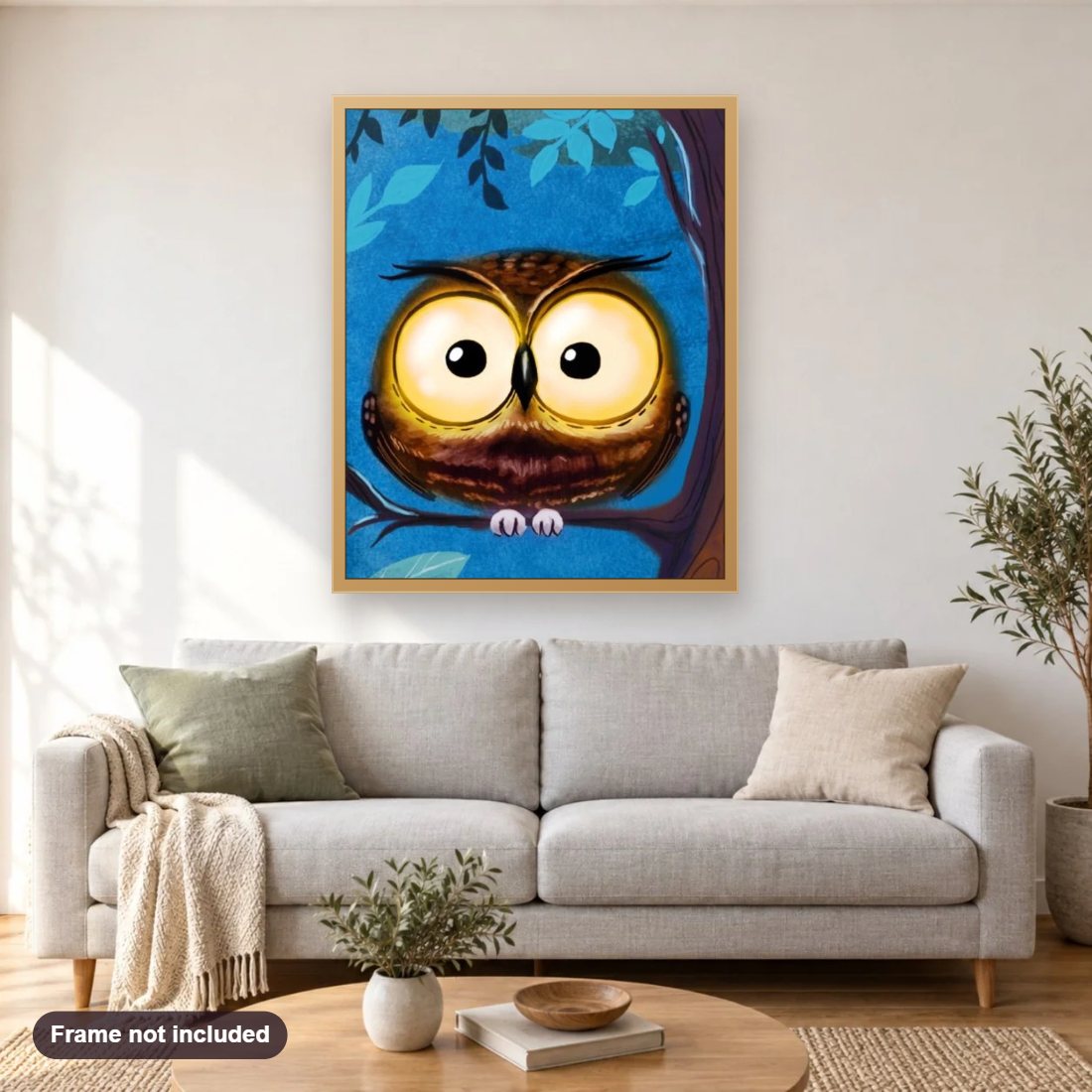 Cartoon Owl with Big Eyes diamond painting shown framed on a living room wall above a sofa
