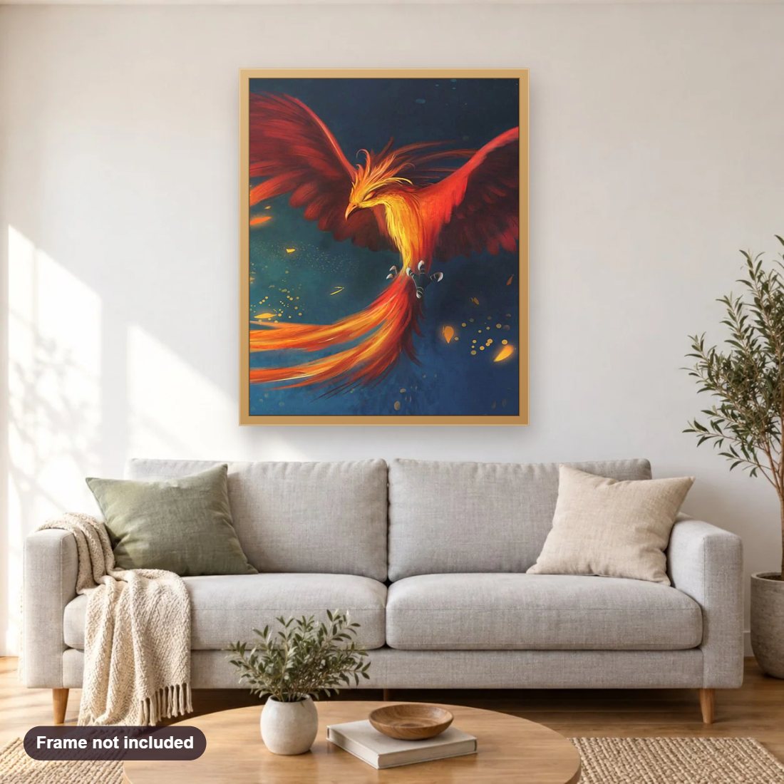 Cartoon Phoenix diamond painting shown framed on a living room wall above a sofa