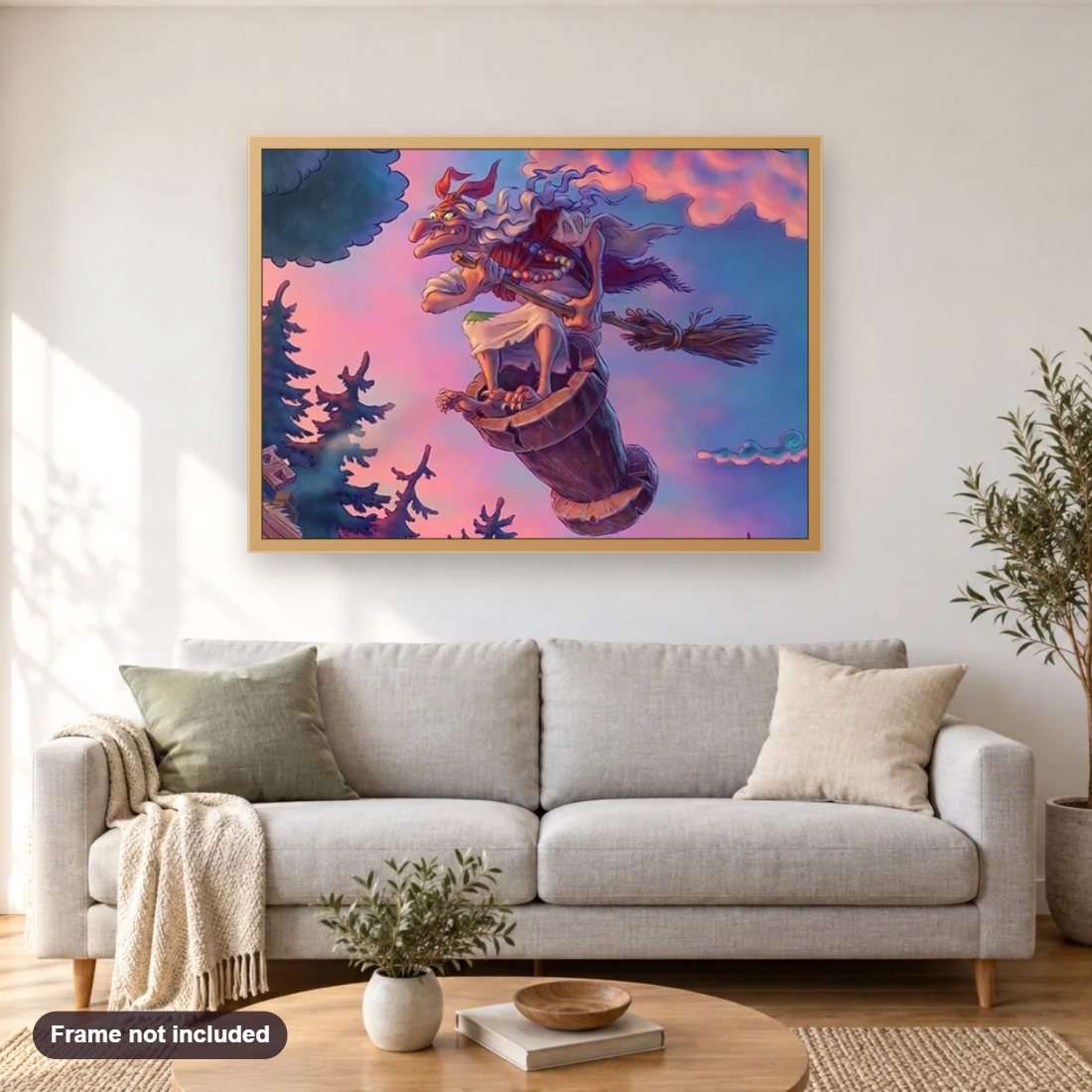 Cartoon Witch diamond painting shown framed on a living room wall above a sofa