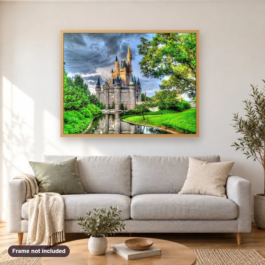Castle in the Forest diamond painting shown framed on a living room wall above a sofa