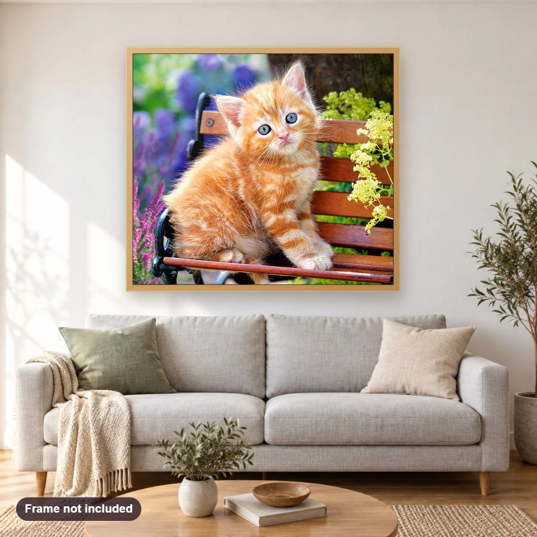 Cat Sitting on Bench diamond painting shown framed on a living room wall above a sofa