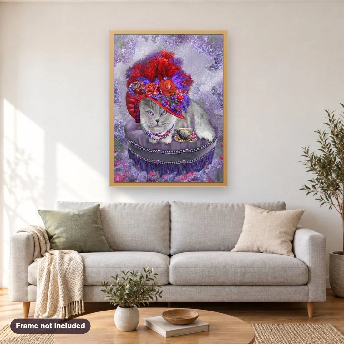 Cat with a Floral Hat & Tea diamond painting shown framed on a living room wall above a sofa