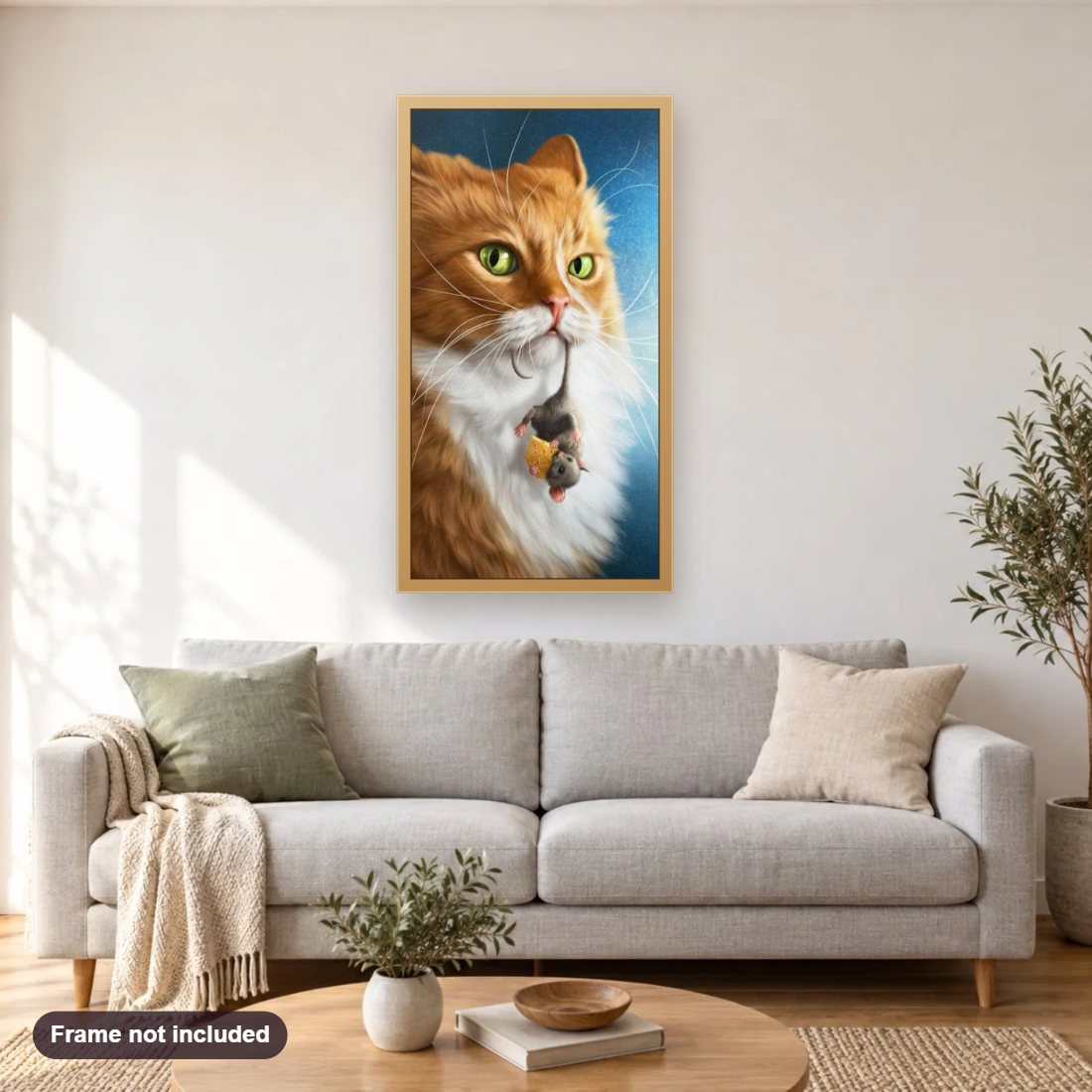 Cat with Mouse in its Mouth diamond painting shown framed on a living room wall above a sofa