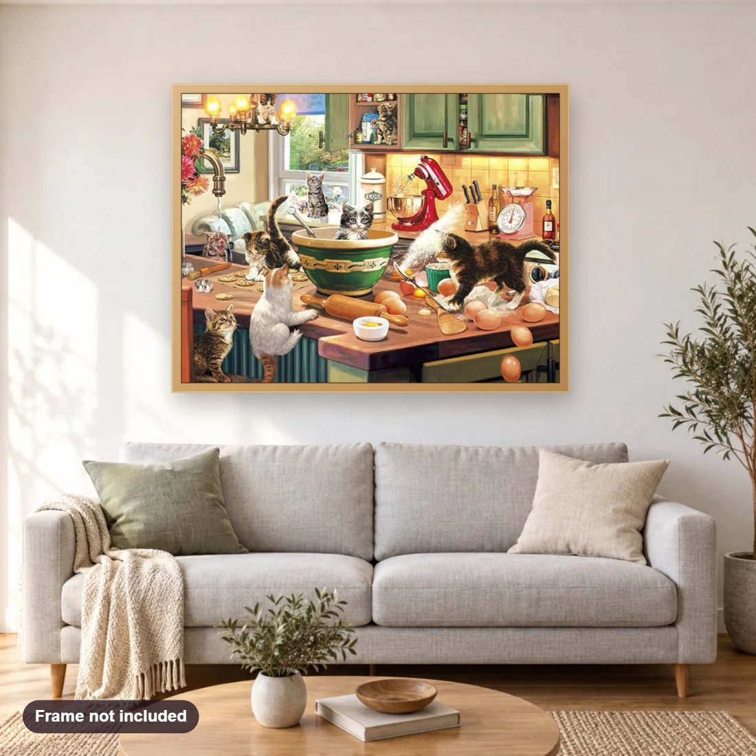 Cats in Kitchen diamond painting shown framed on a living room wall above a sofa