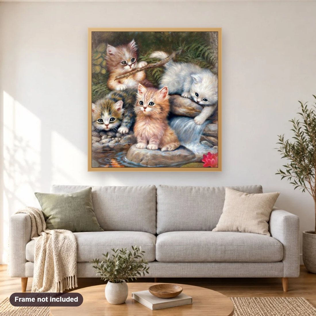 Cats Nest diamond painting shown framed on a living room wall above a sofa