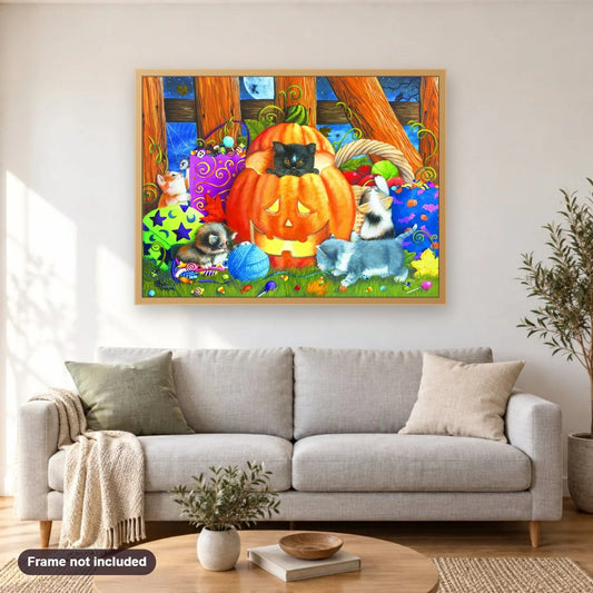 Cats & Pumpkin diamond painting shown framed on a living room wall above a sofa