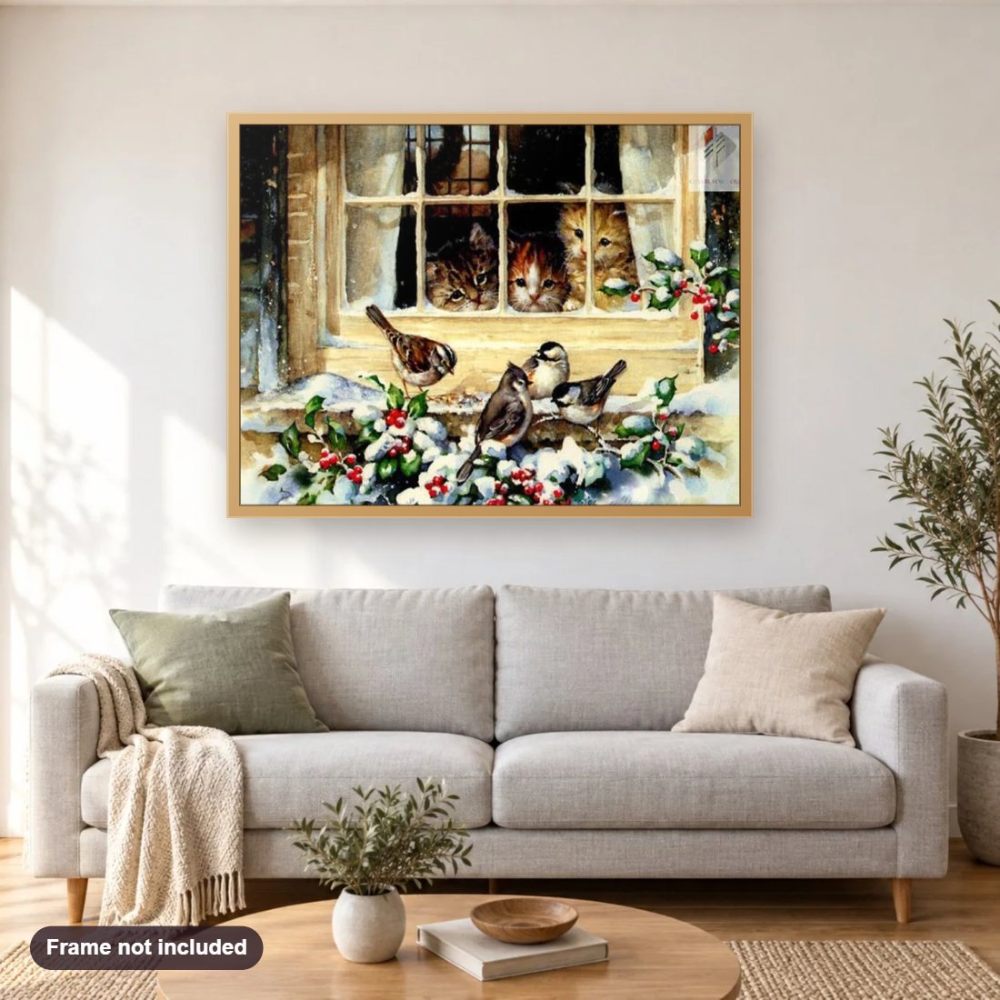 Cats Starring Sparrows from Window diamond painting shown framed on a living room wall above a sofa
