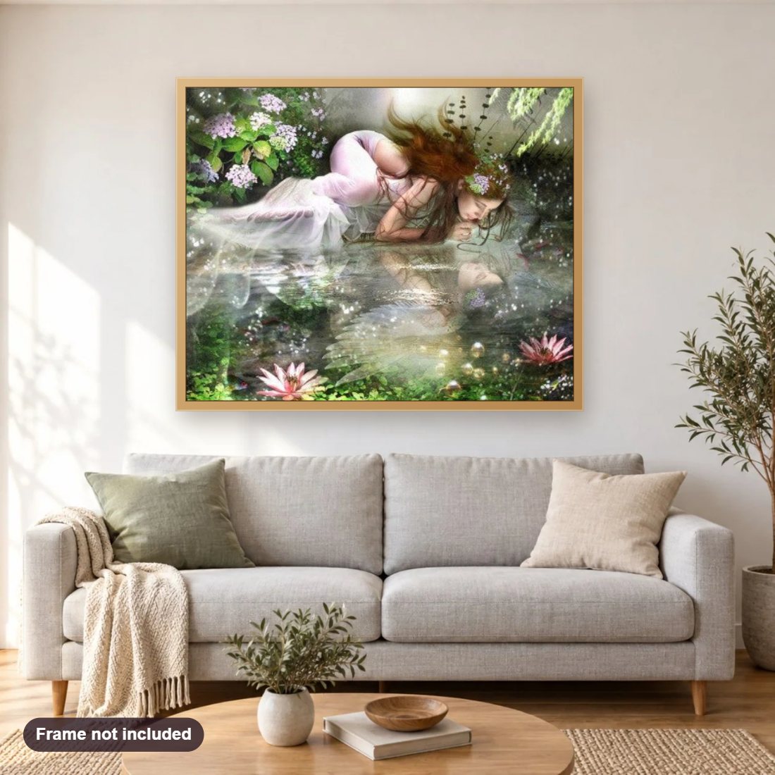 Celtic Goddess diamond painting shown framed on a living room wall above a sofa