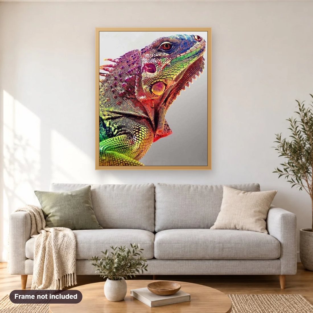 Chameleon diamond painting shown framed on a living room wall above a sofa