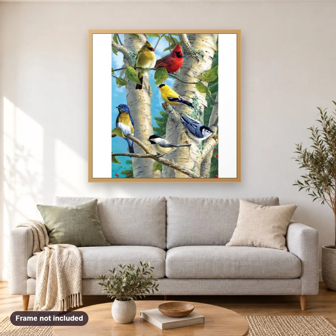 Charming Birds diamond painting shown framed on a living room wall above a sofa