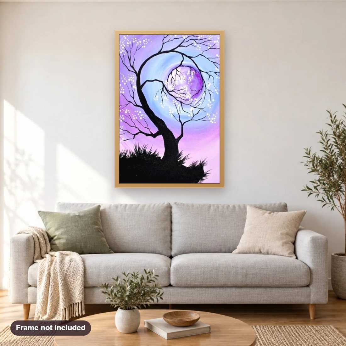 Cherry Tree holding the Moon diamond painting shown framed on a living room wall above a sofa