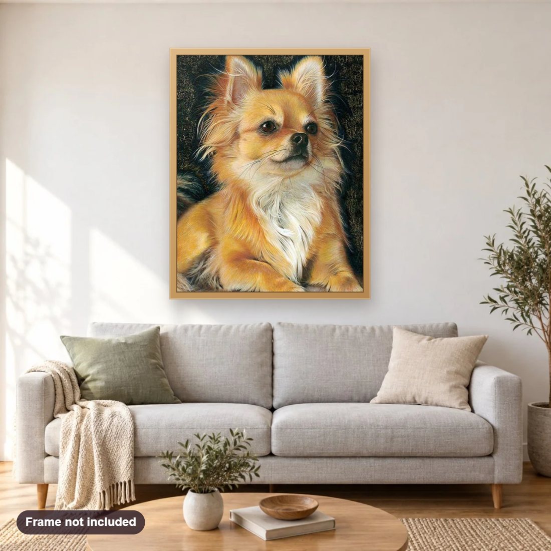 Chihuahua diamond painting shown framed on a living room wall above a sofa