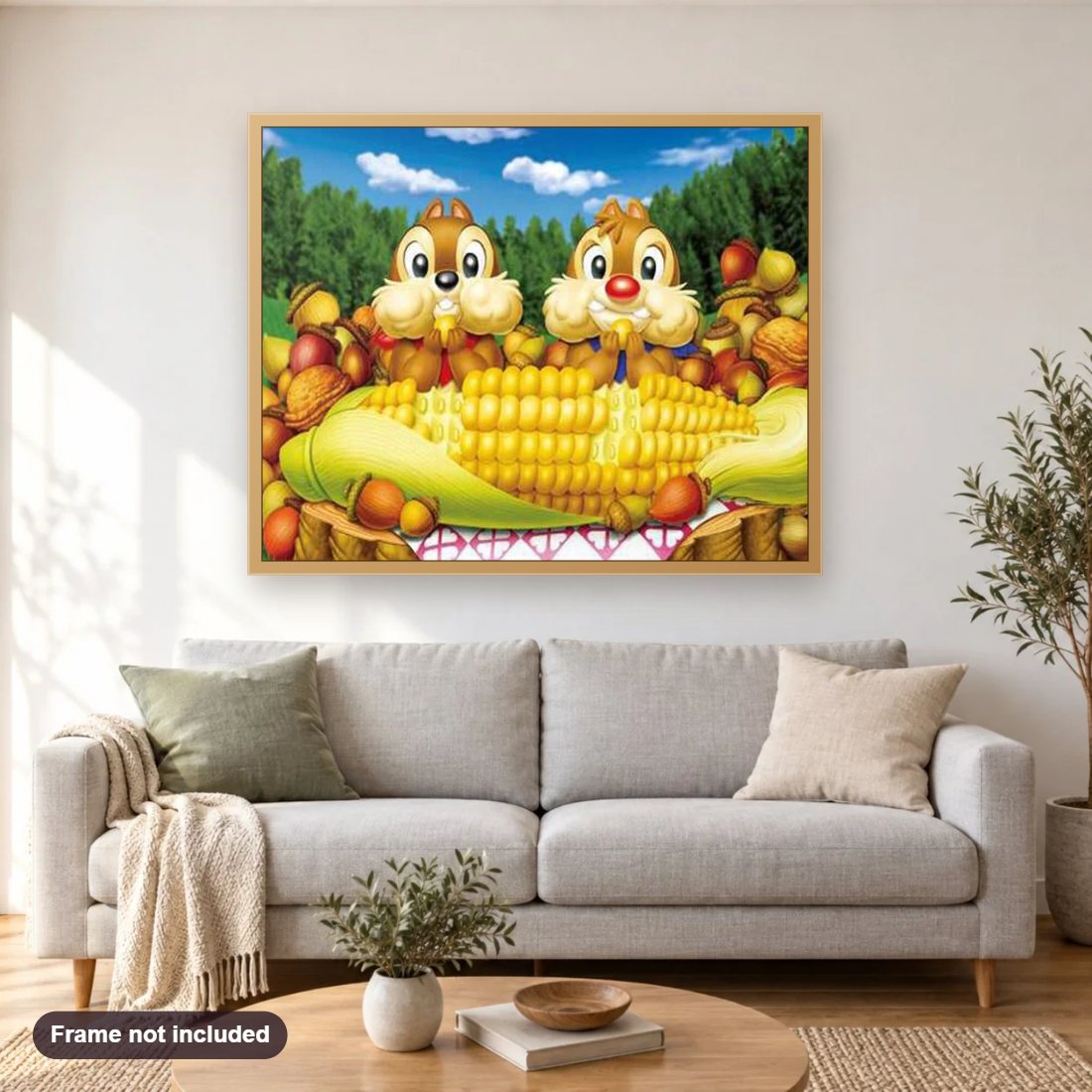 Chip & Dale diamond painting shown framed on a living room wall above a sofa