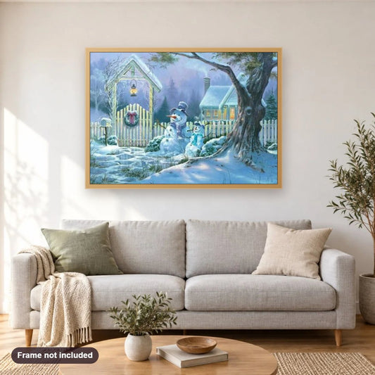 Christmas Eve & Snow Men diamond painting shown framed on a living room wall above a sofa