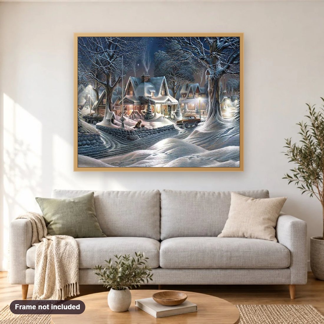 Christmas Season Snow Scene diamond painting shown framed on a living room wall above a sofa
