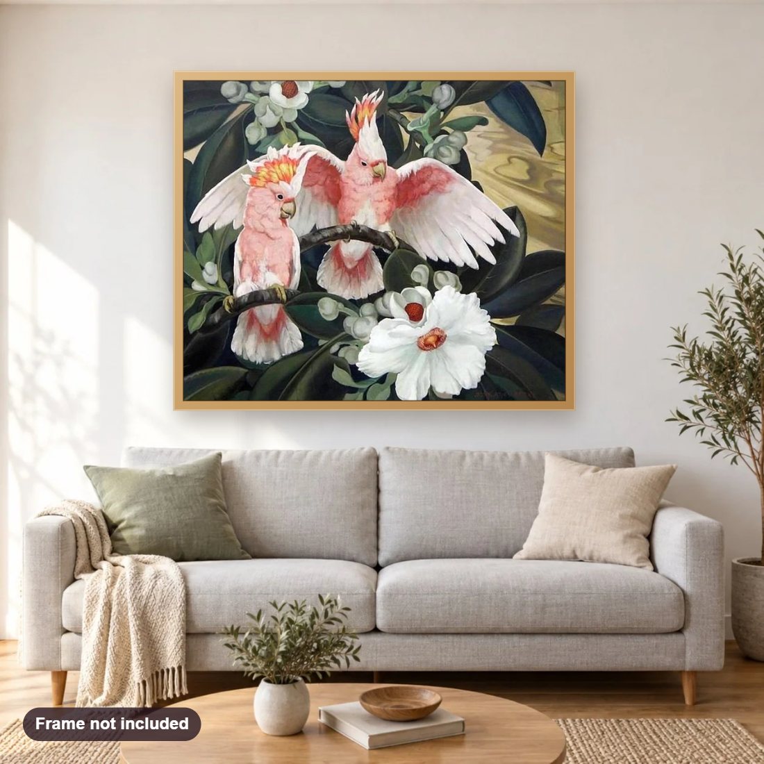 Cockatiel Parrots & Flowers diamond painting shown framed on a living room wall above a sofa