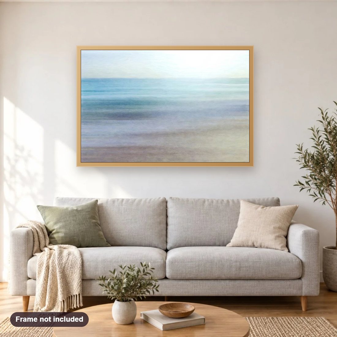 Color Of The Sea diamond painting shown framed on a living room wall above a sofa