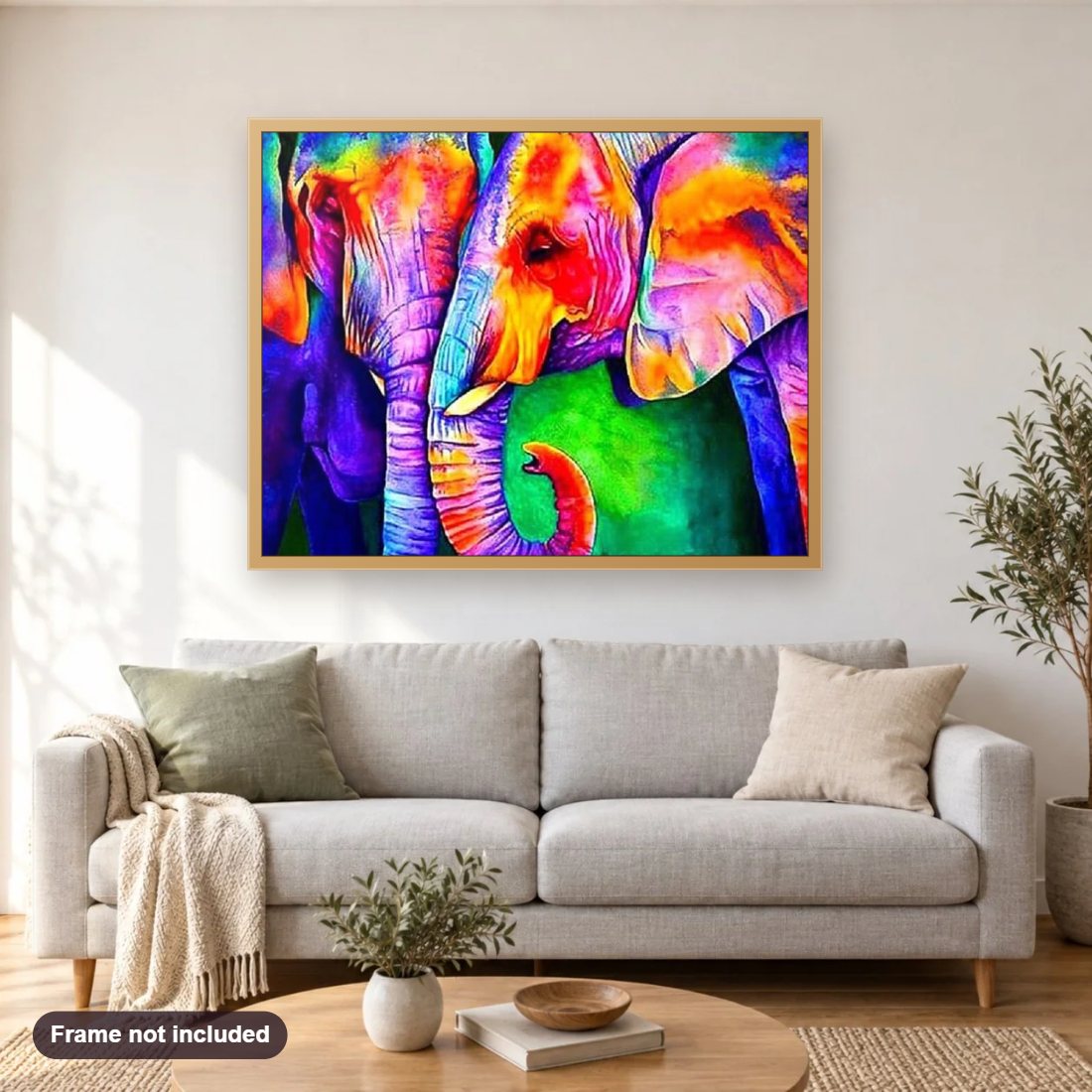 Colorful Elephant Pair diamond painting shown framed on a living room wall above a sofa