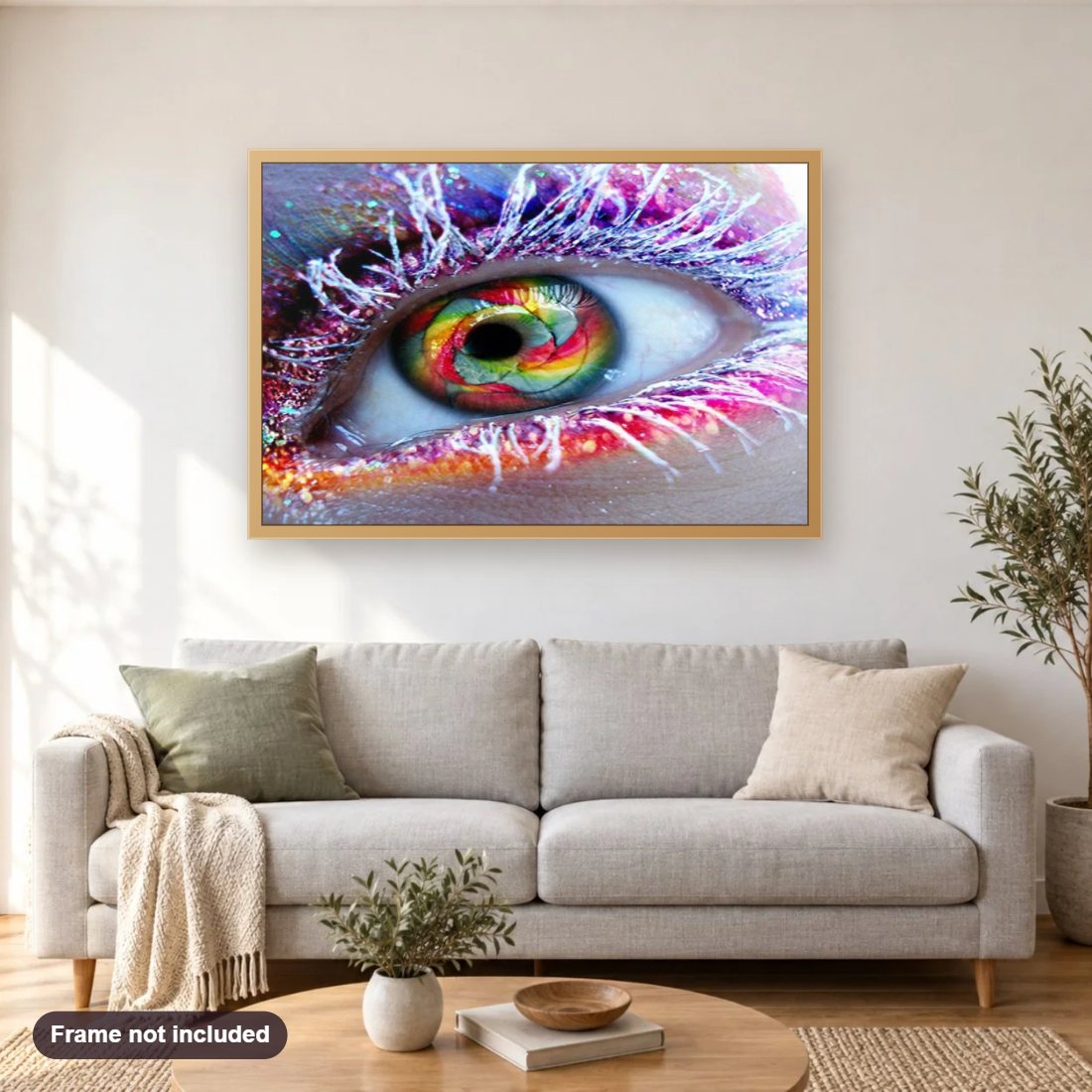 Colorful Eye diamond painting shown framed on a living room wall above a sofa