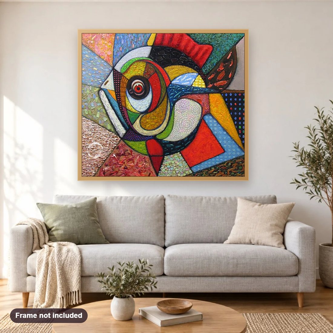 Colorful Fish Art diamond painting shown framed on a living room wall above a sofa