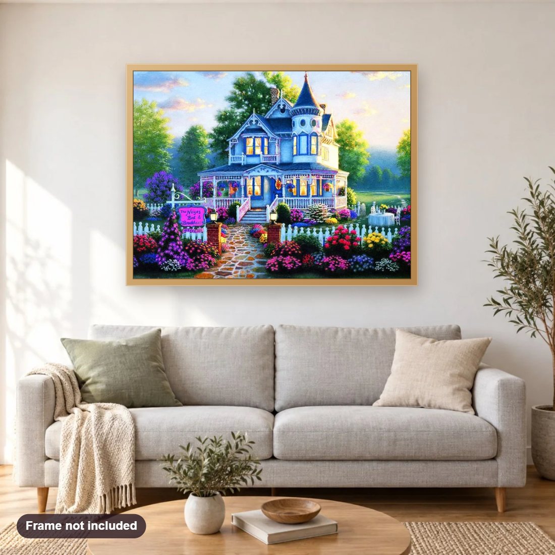 Colorful Flowers Outside the Villa diamond painting shown framed on a living room wall above a sofa