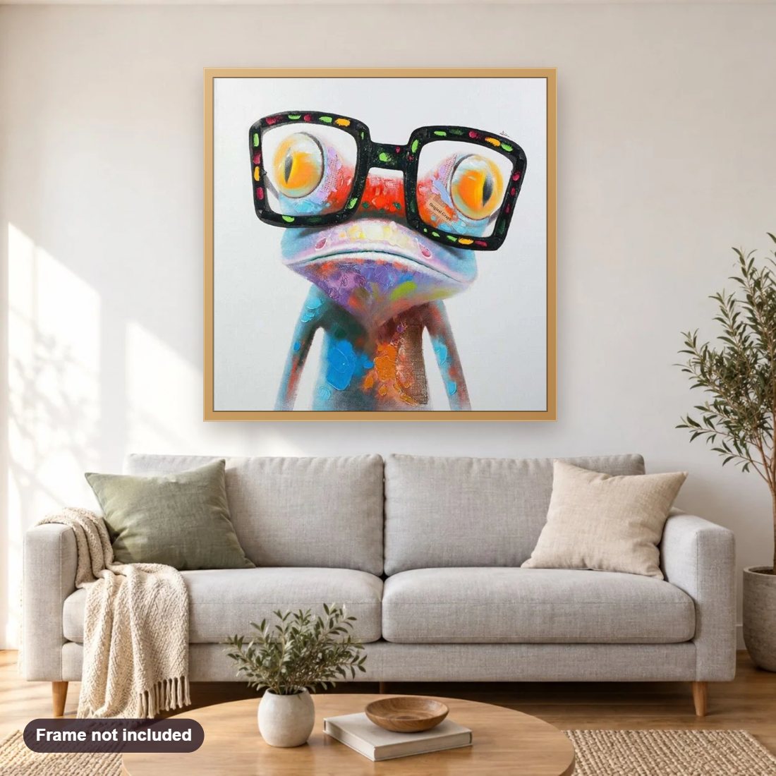 Colorful Frog diamond painting shown framed on a living room wall above a sofa
