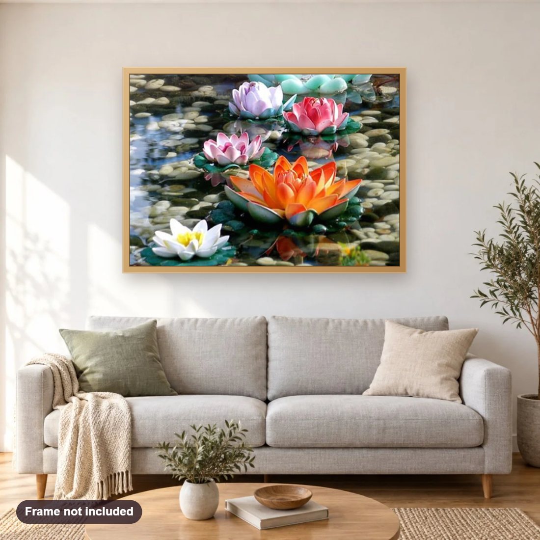 Colorful Lotus Flowers diamond painting shown framed on a living room wall above a sofa