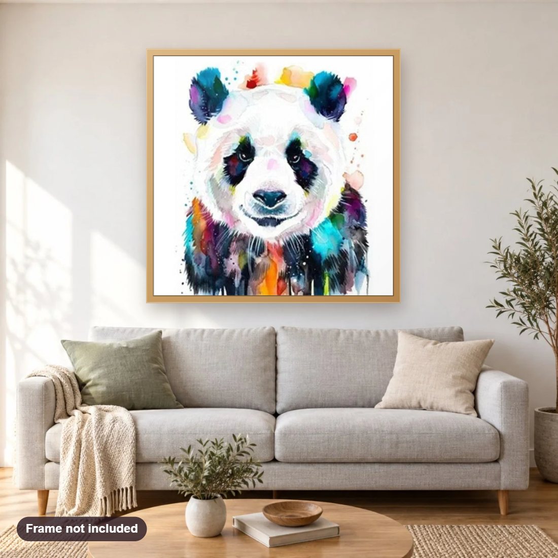 Colorful Panda diamond painting shown framed on a living room wall above a sofa