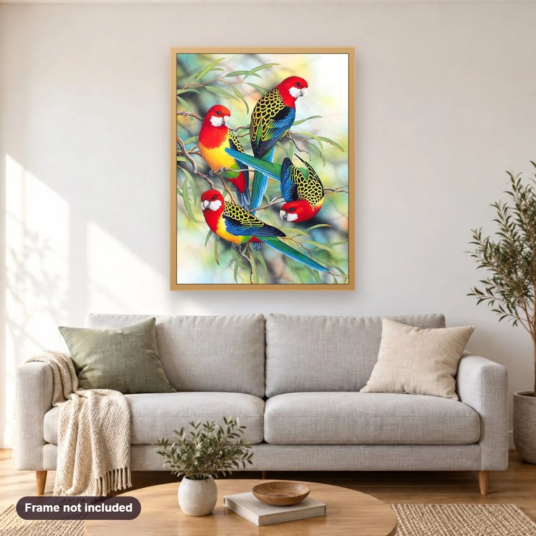 Colorful Parrots on Trees diamond painting shown framed on a living room wall above a sofa
