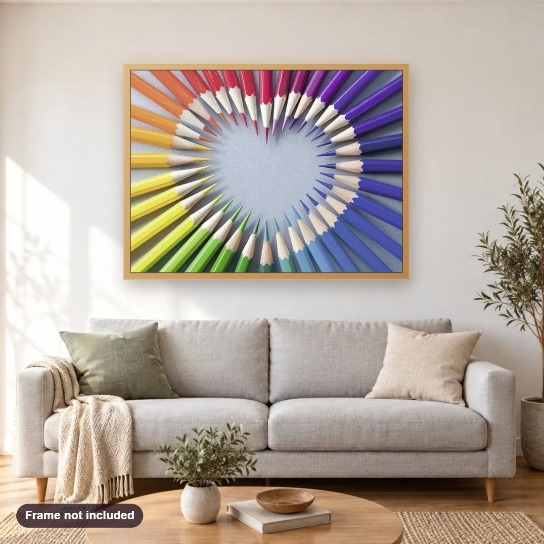 Colorful Pencil Heart diamond painting shown framed on a living room wall above a sofa