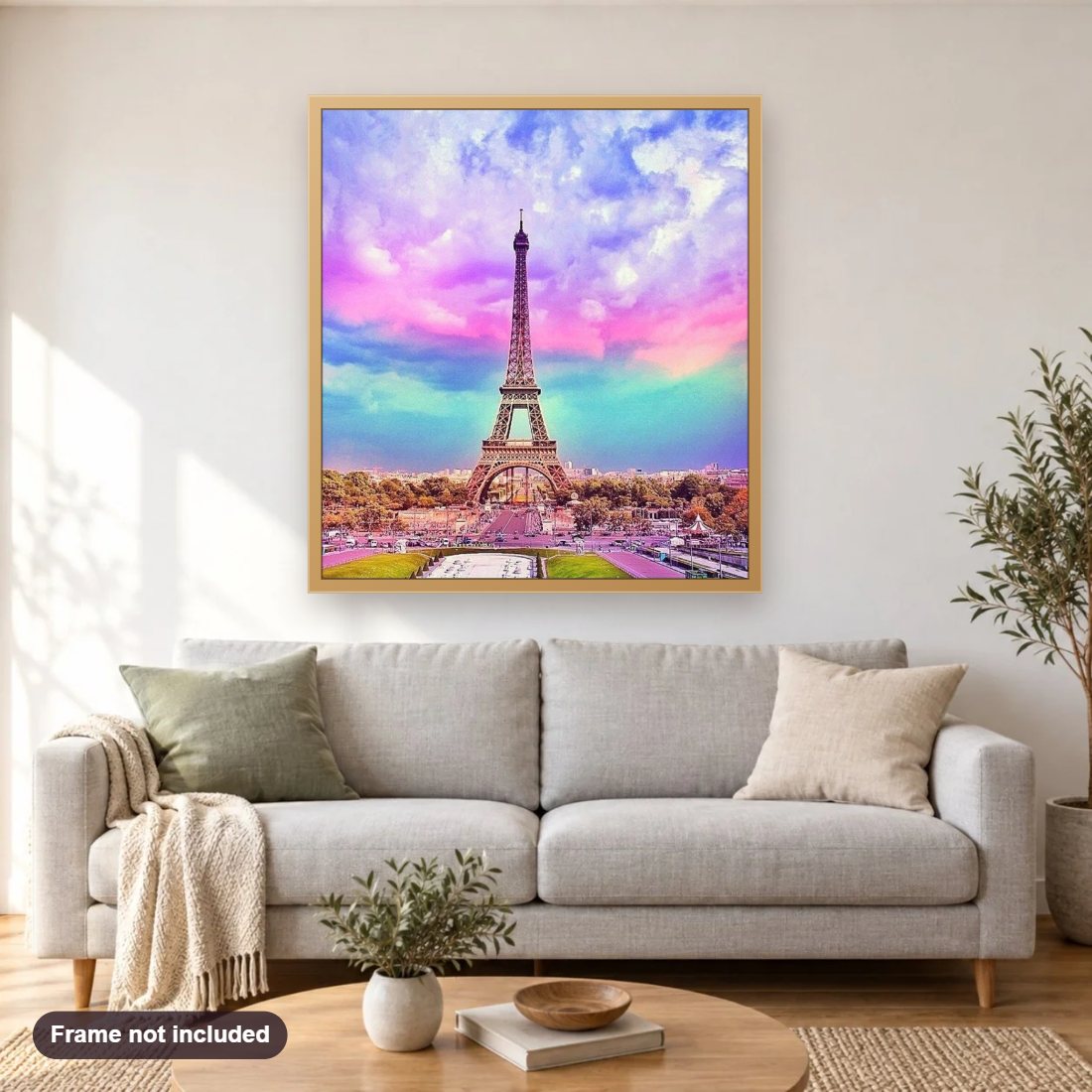 Colorful Sky & Eiffel Tower diamond painting shown framed on a living room wall above a sofa