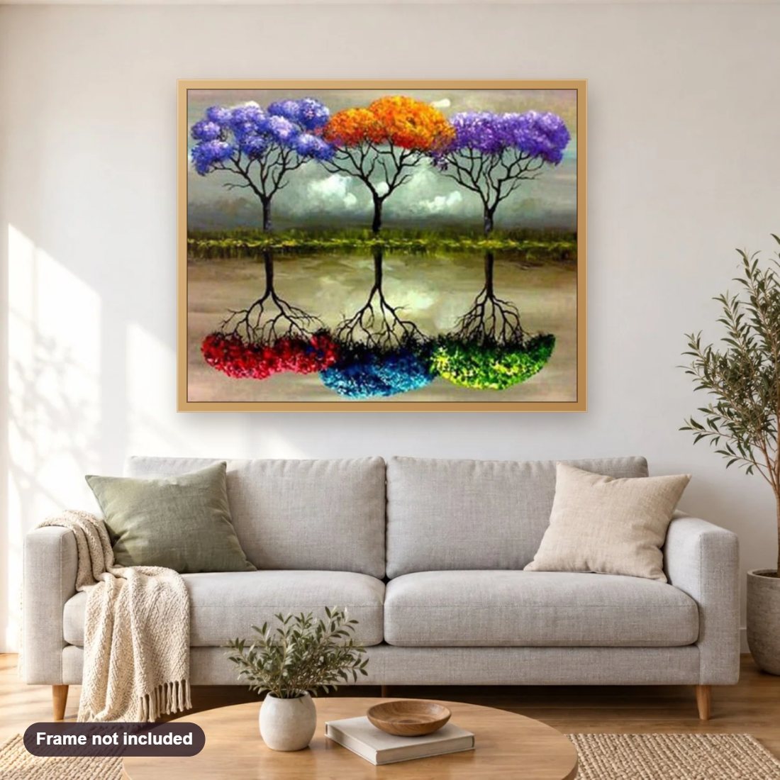 Colorful Trees diamond painting shown framed on a living room wall above a sofa