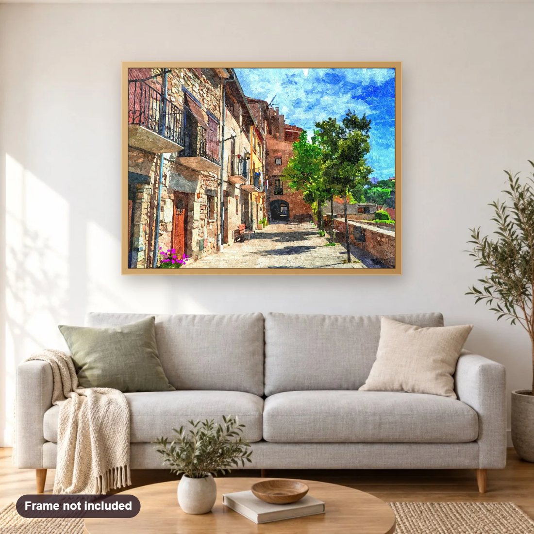 Colorful Village Street diamond painting shown framed on a living room wall above a sofa