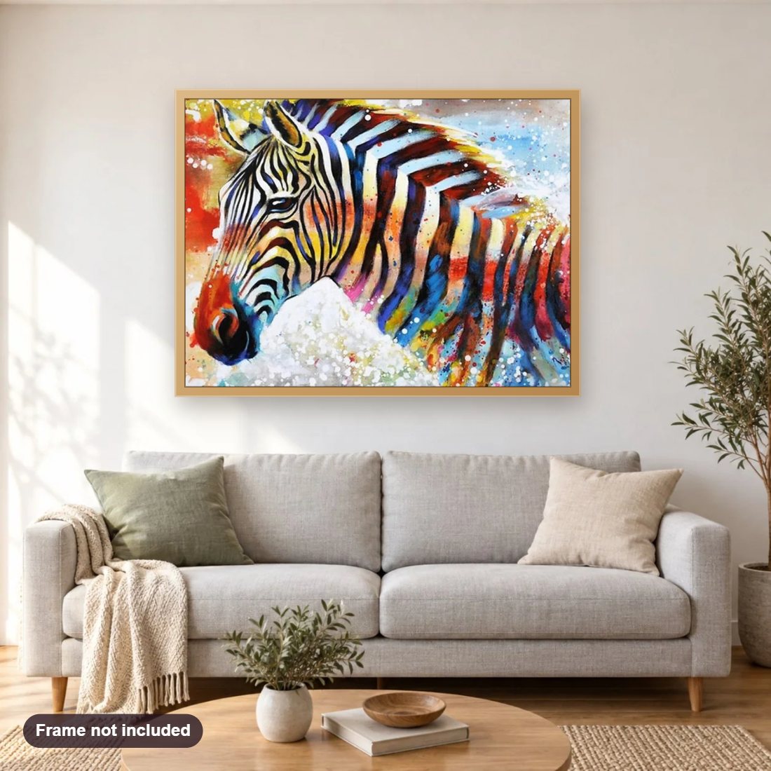 Colorful Zebra diamond painting shown framed on a living room wall above a sofa