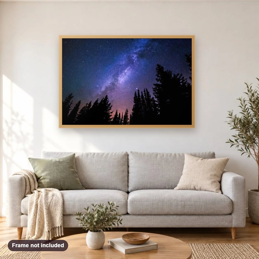 Conifers Reaching To Milky Way diamond painting shown framed on a living room wall above a sofa
